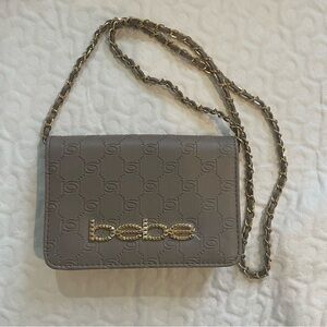 NWOT, Bebe Celia Monogram Flap Crossbody Purse in GRAY